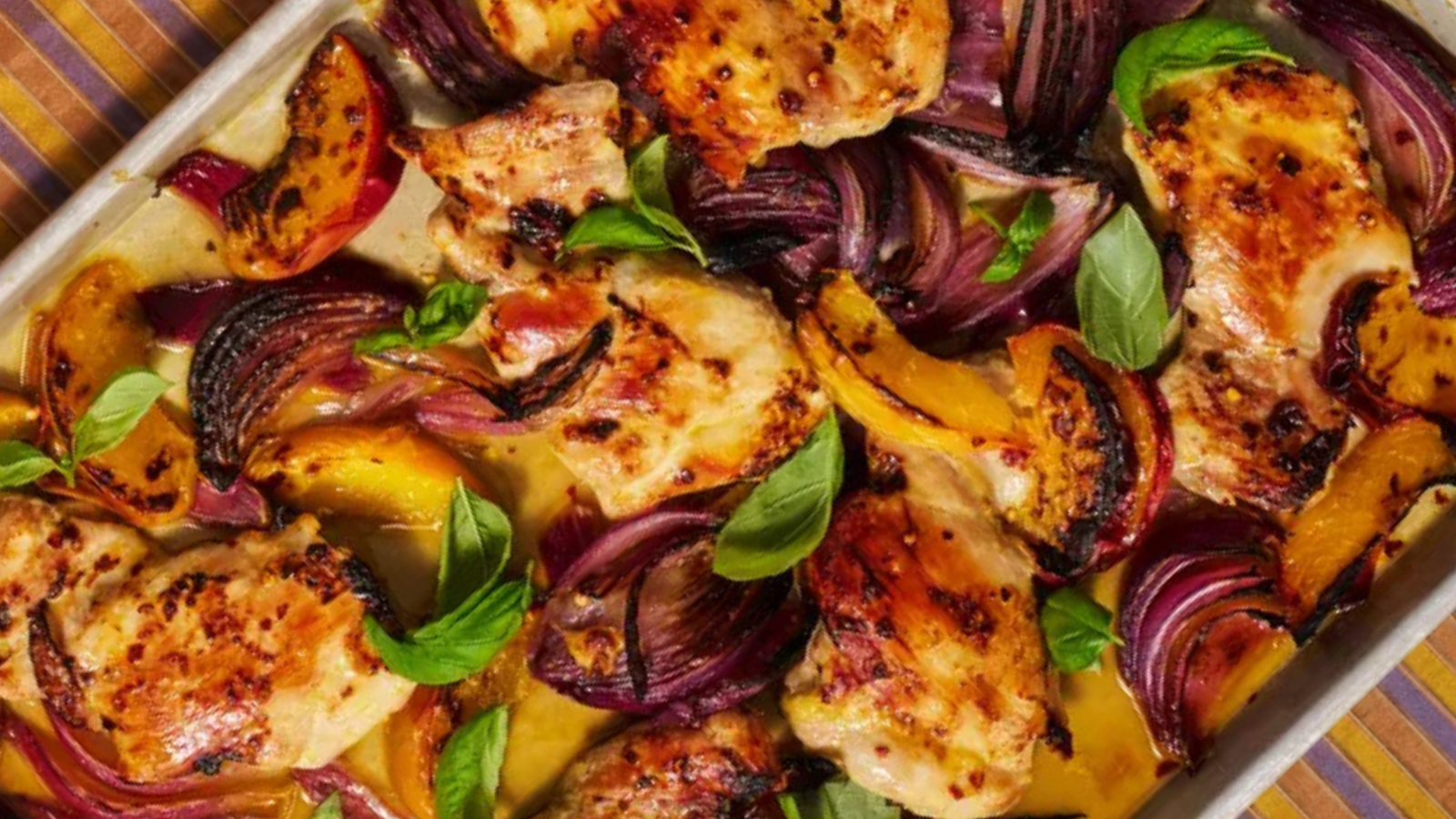 Root vegetable and rosemary chicken tray bake