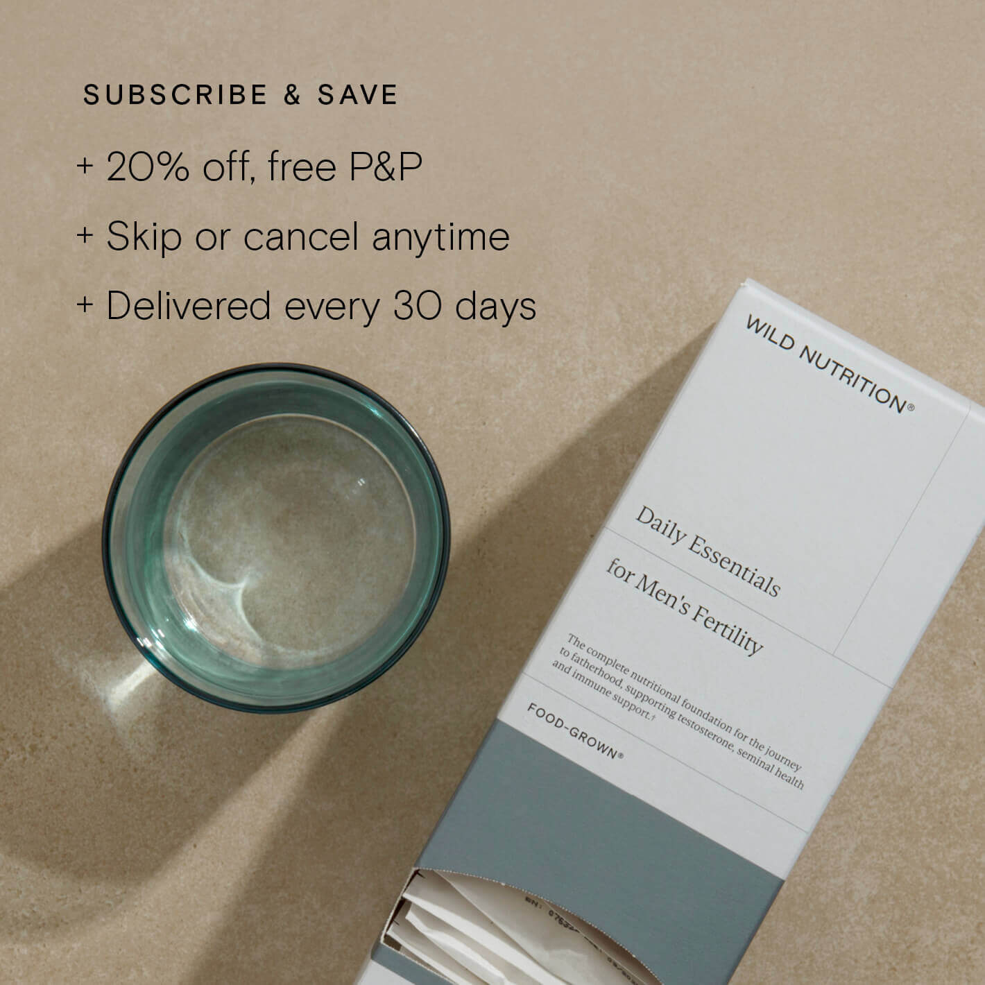 Daily Essentials for Men's Fertility box with a glass of water, highlighting subscription benefits.