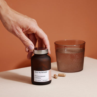 Perimenopause complex jar, supplement and water image