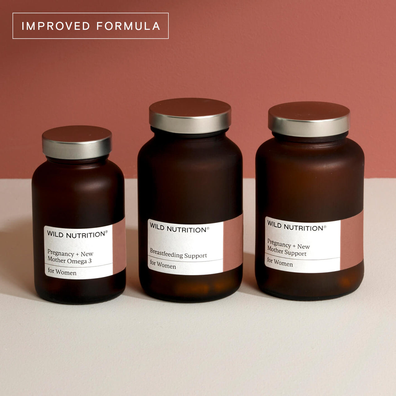 Wild Nutrition breastfeeding support trio for women featuring pregnancy and new mother vitamins in amber glass jars.