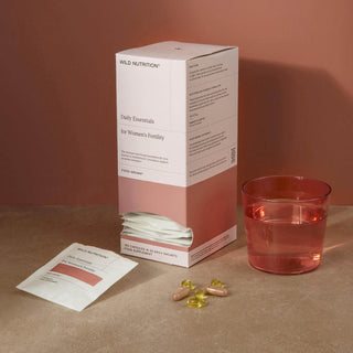 Box and sachet of daily essentials for women's fertility