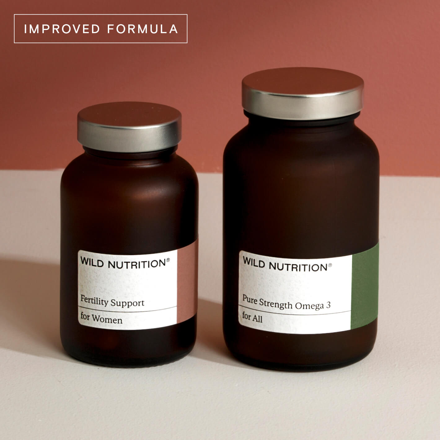 Wild Nutrition Women's Fertility Duo with improved formula, featuring Fertility Support and Pure Strength Omega 3 bottles.