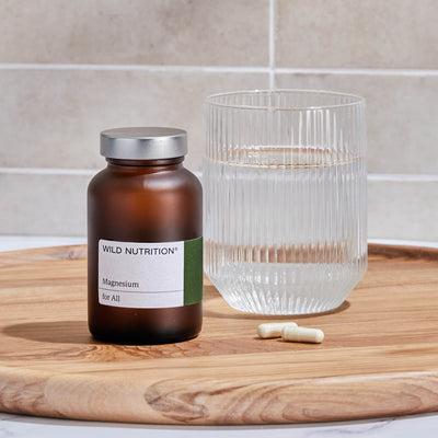 Jar of Magnesium with a glass of water