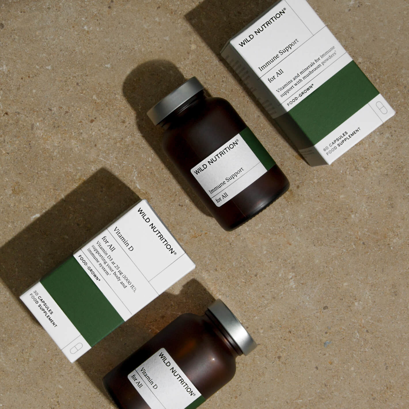 Immune Support Duo by Wild Nutrition featuring Food-Grown Vitamins D, C, Selenium, mushrooms, and Elderberry extract.