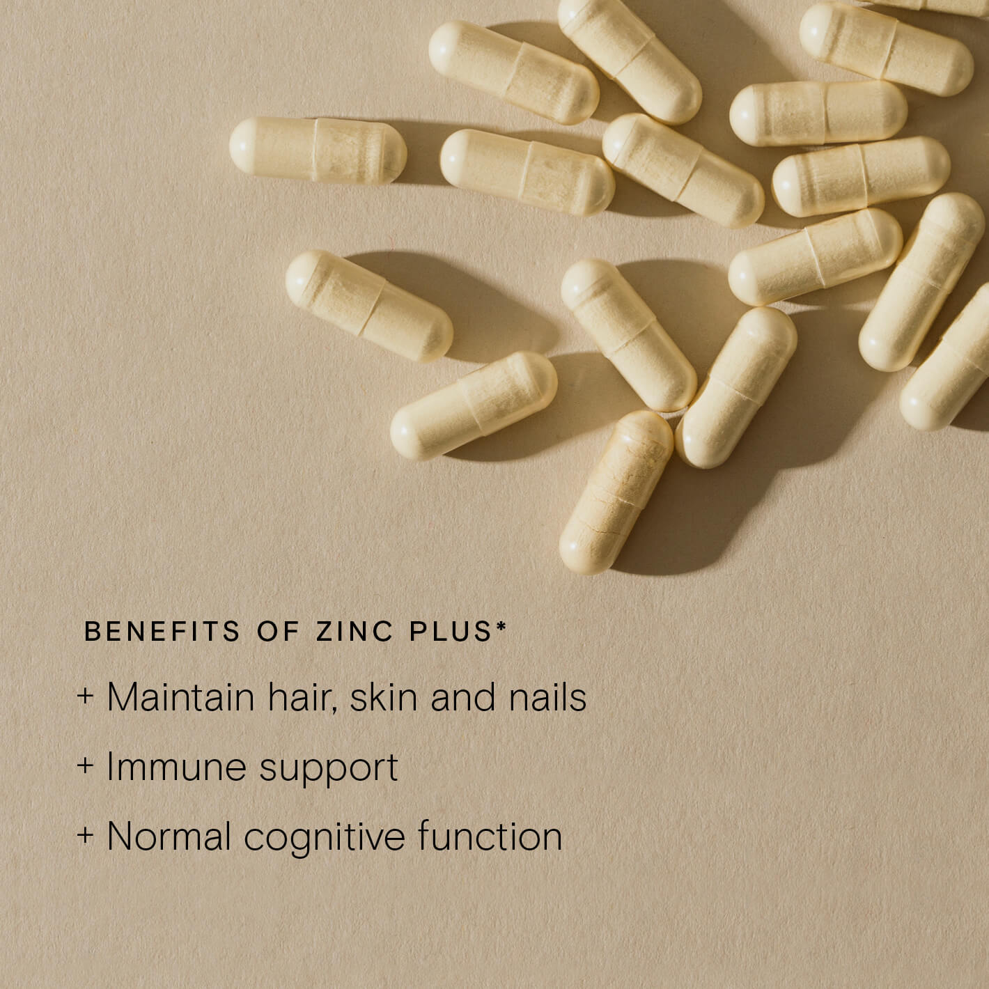 Zinc Plus capsules showcasing benefits for hair, skin and nails, immune support, and cognitive function, on a neutral background.